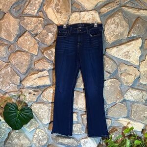 Stretchy boot cut mid rise dark jeans